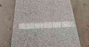 德阳芝麻白光面毛板