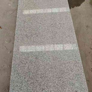 德阳芝麻白光面毛板