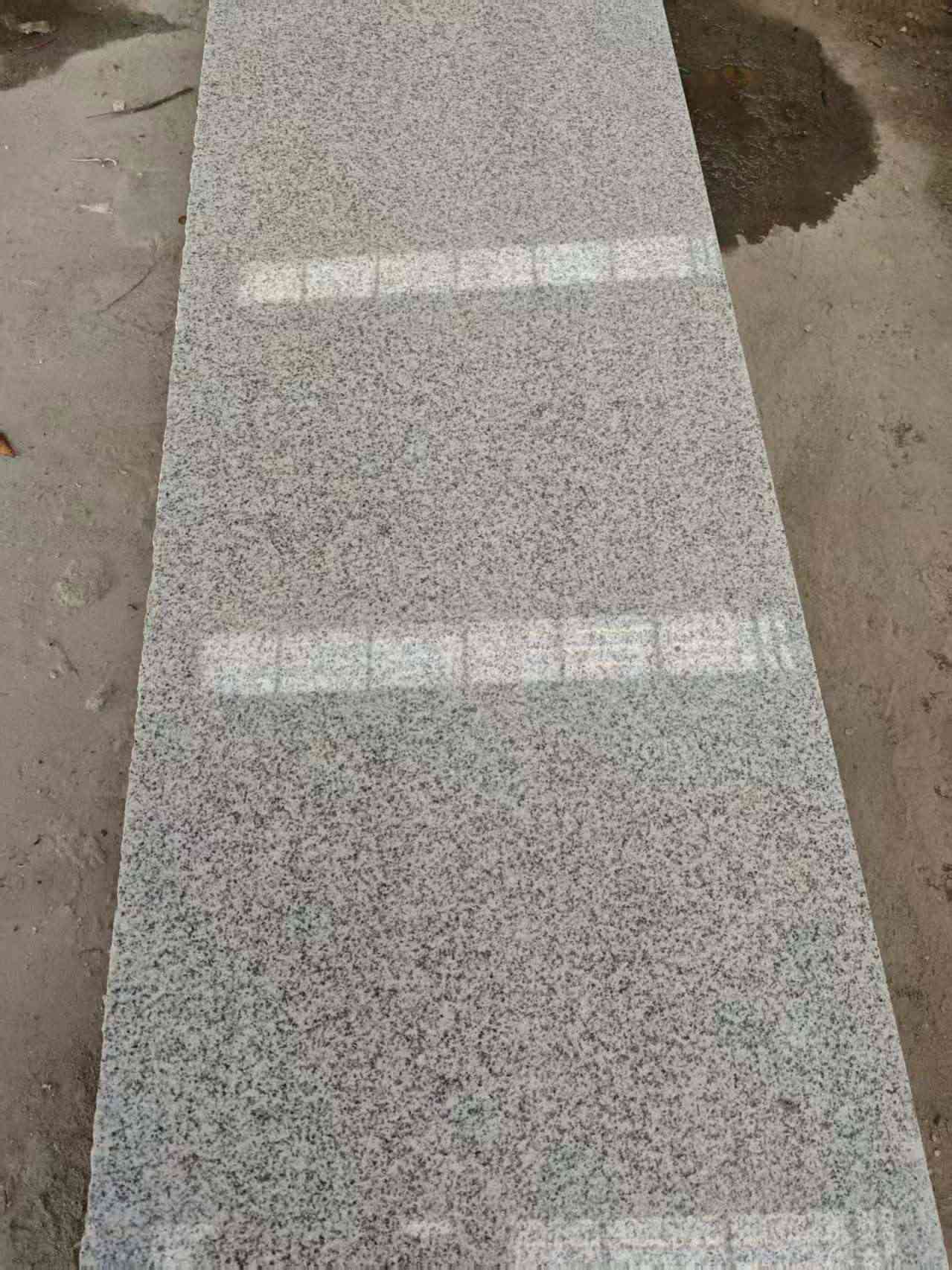 德阳芝麻白光面毛板